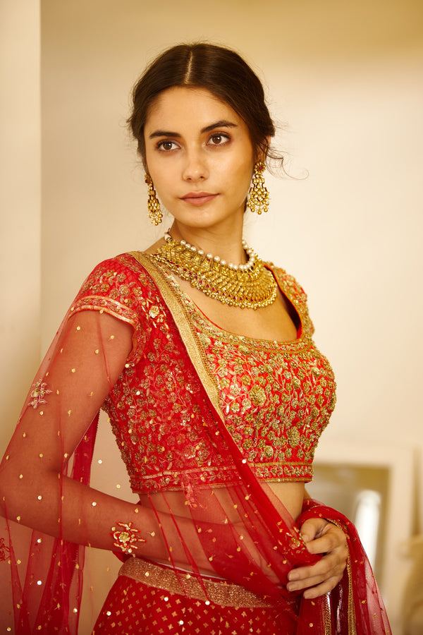 Orange Red Lehenga Set.