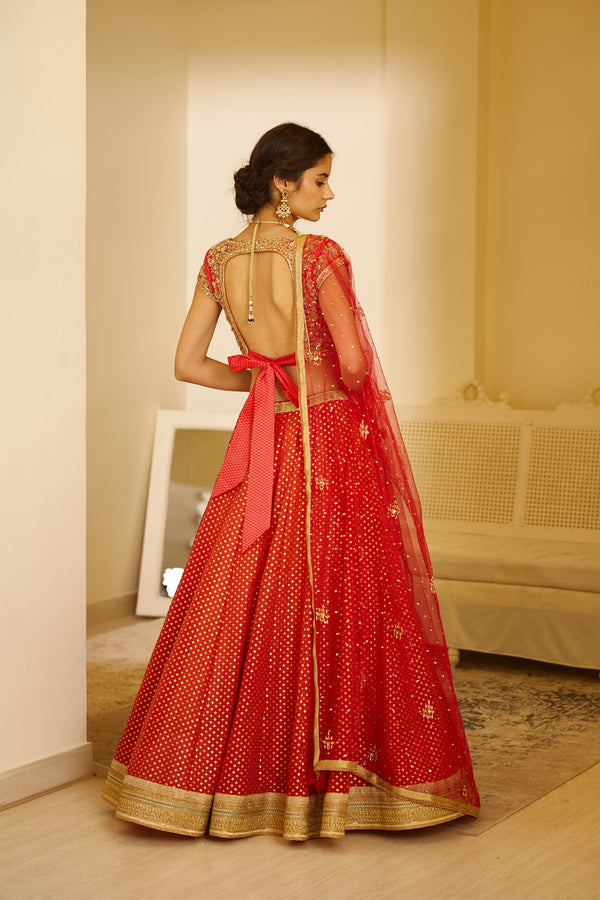 Orange Red Lehenga Set.