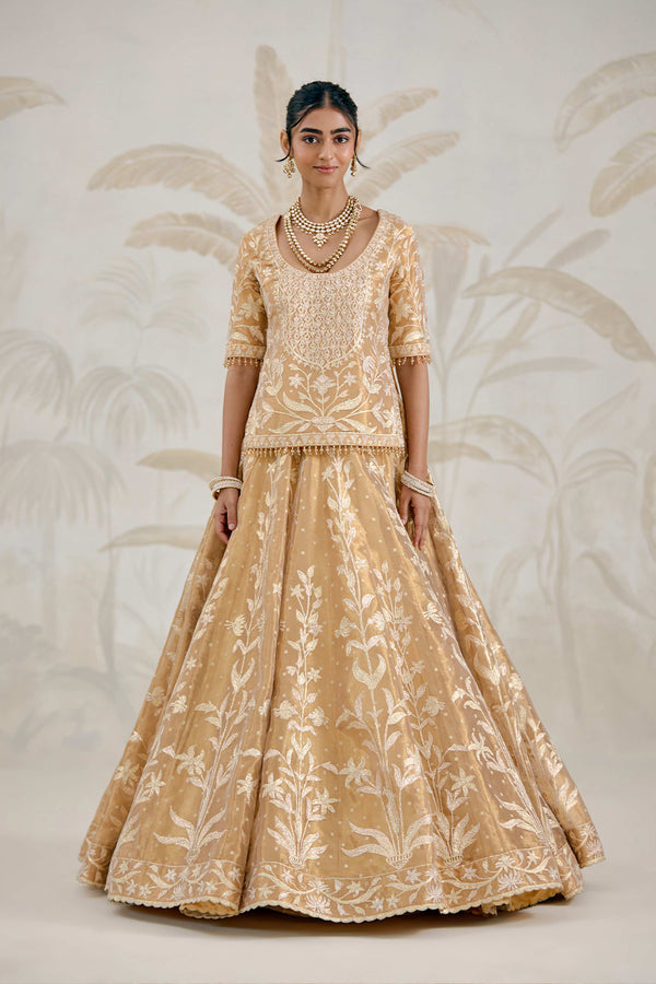 Gold Kurti-Lehenga Set.