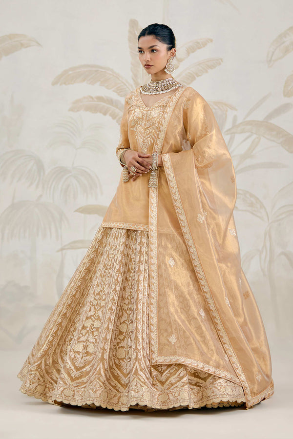 Gold Kurti-Lehenga Set.
