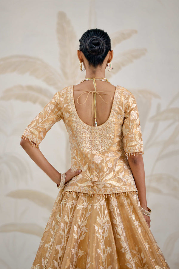 Gold Kurti-Lehenga Set.