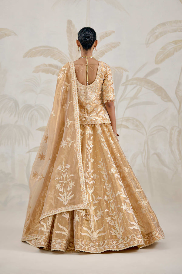 Gold Kurti-Lehenga Set.