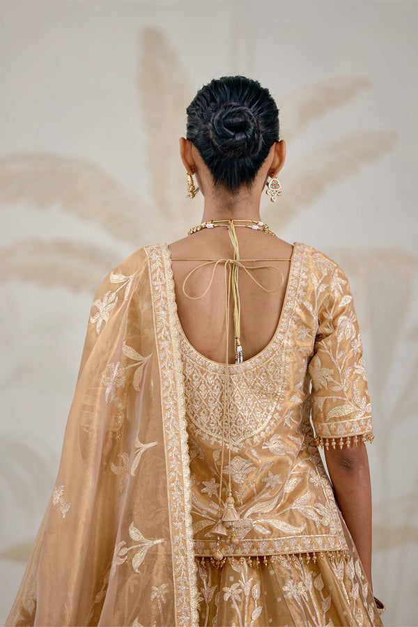 Gold Kurti-Lehenga Set.