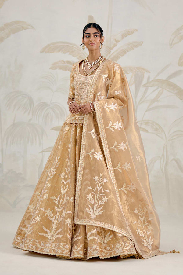 Gold Kurti-Lehenga Set.