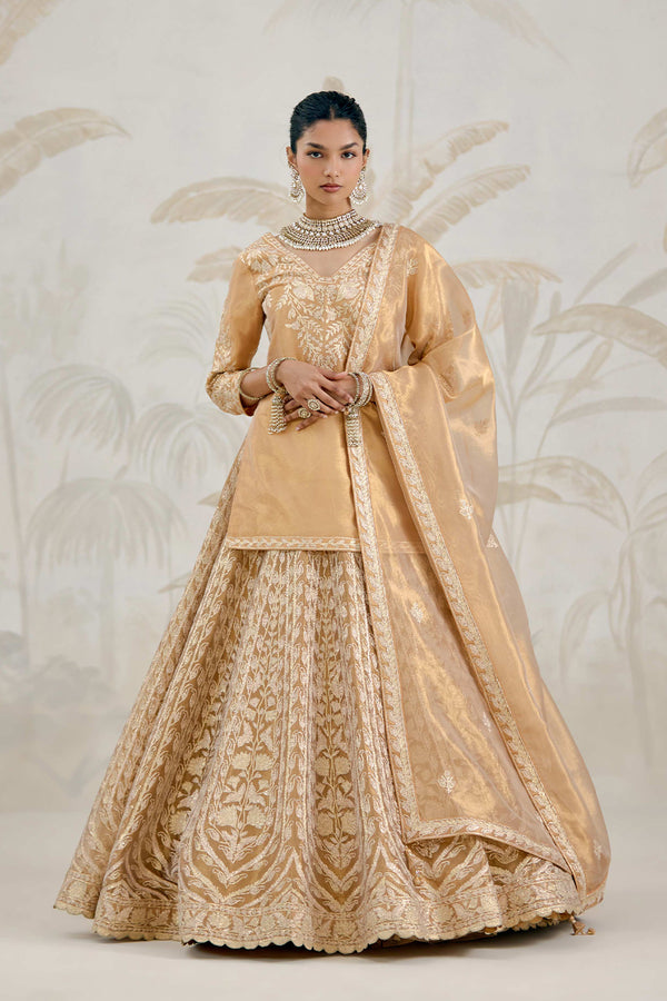 Gold Kurti-Lehenga Set.