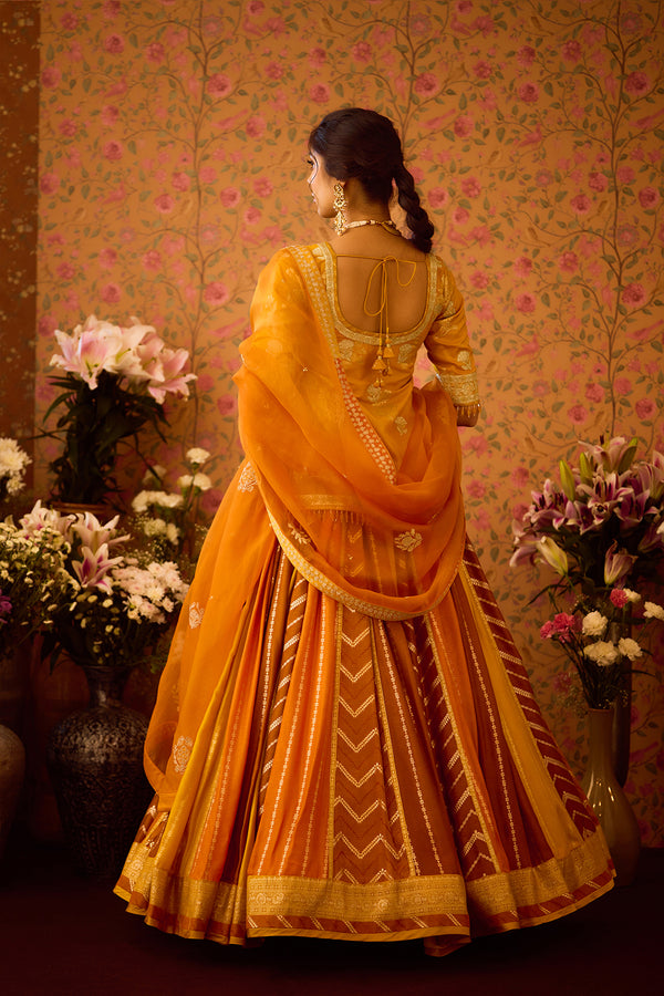 Yam Yellow Choli Lehenga Set.