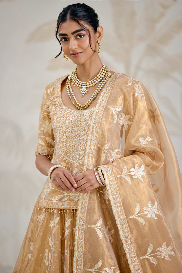 Gold Kurti-Lehenga Set.