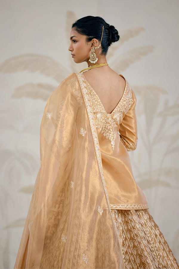 Gold Kurti-Lehenga Set.