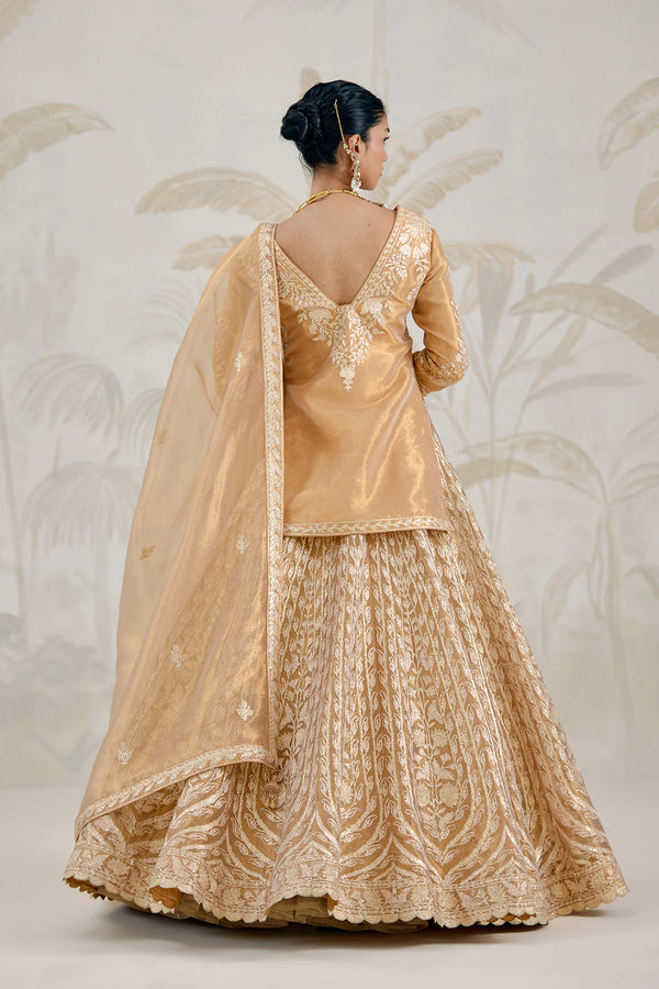Gold Kurti-Lehenga Set.
