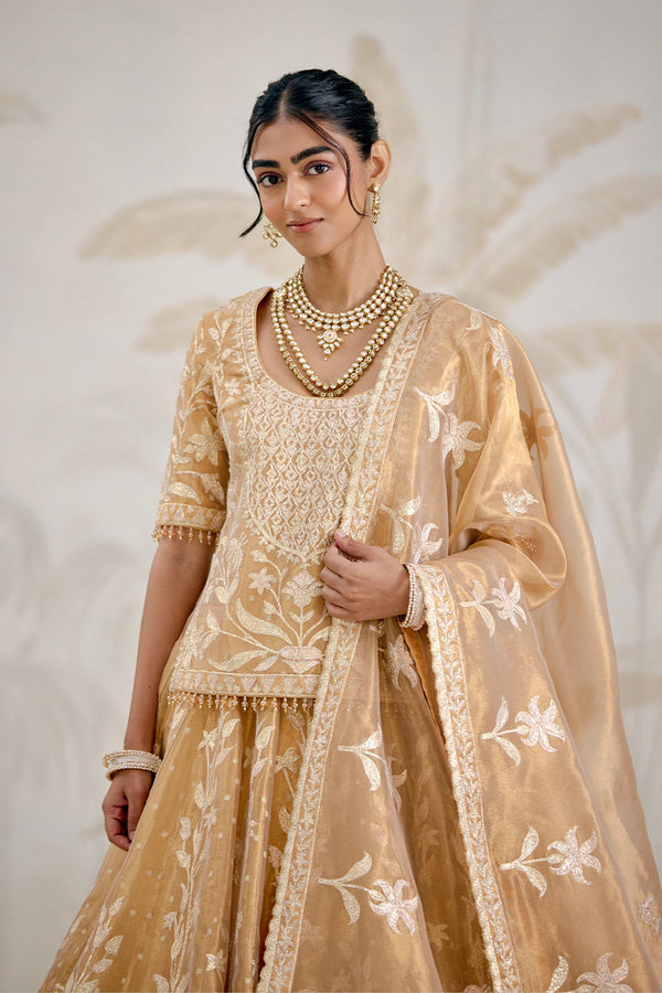 Gold Kurti-Lehenga Set.