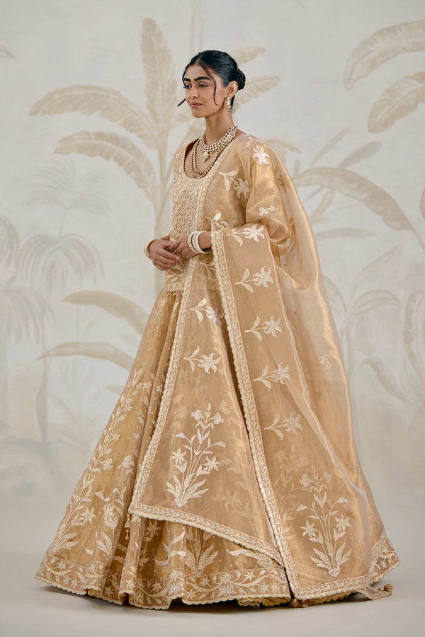 Gold Kurti-Lehenga Set.
