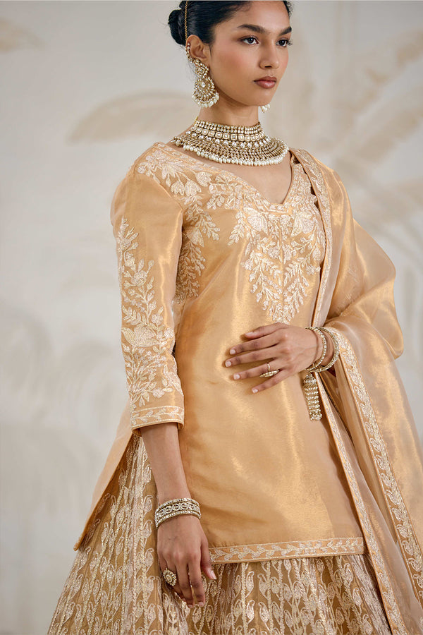Gold Kurti-Lehenga Set.