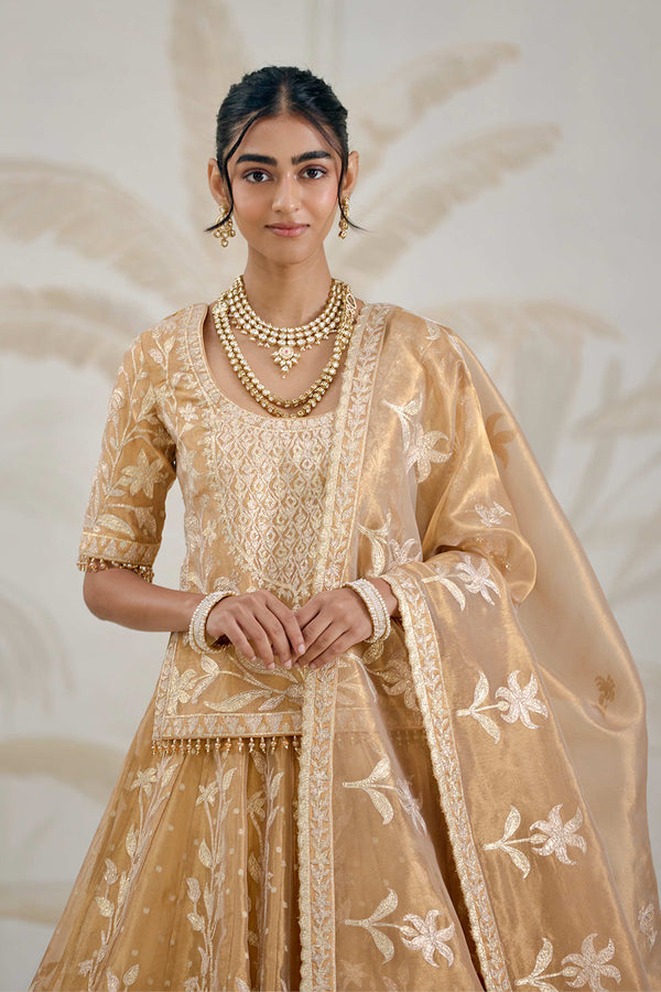 Gold Kurti-Lehenga Set.