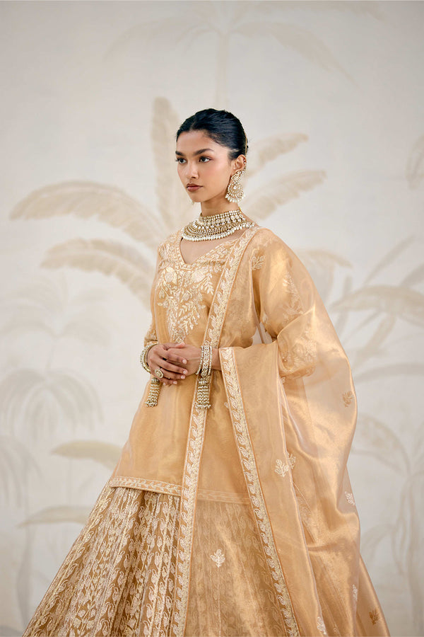 Gold Kurti-Lehenga Set.