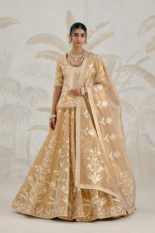 Gold Kurti-Lehenga Set.