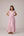 Blush pink panelled dress with contrast striped cord piping paired with a tie-up matching overlay