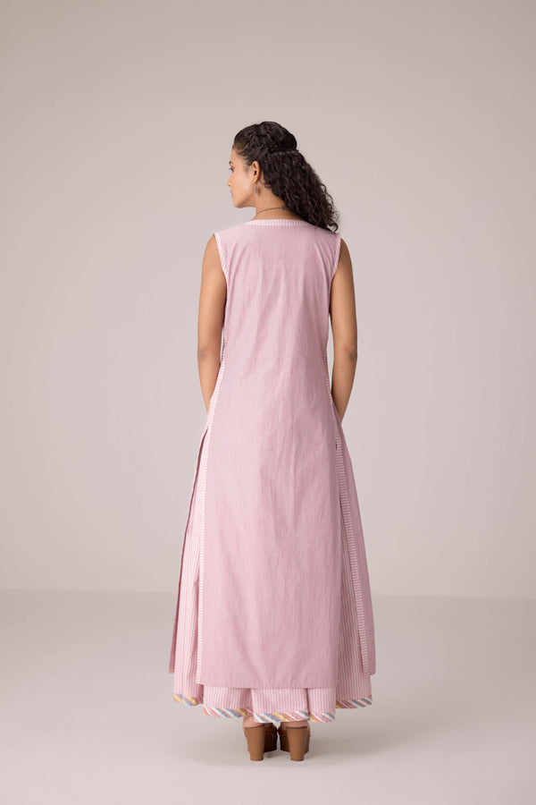 Blush pink panelled dress with contrast striped cord piping paired with a tie-up matching overlay