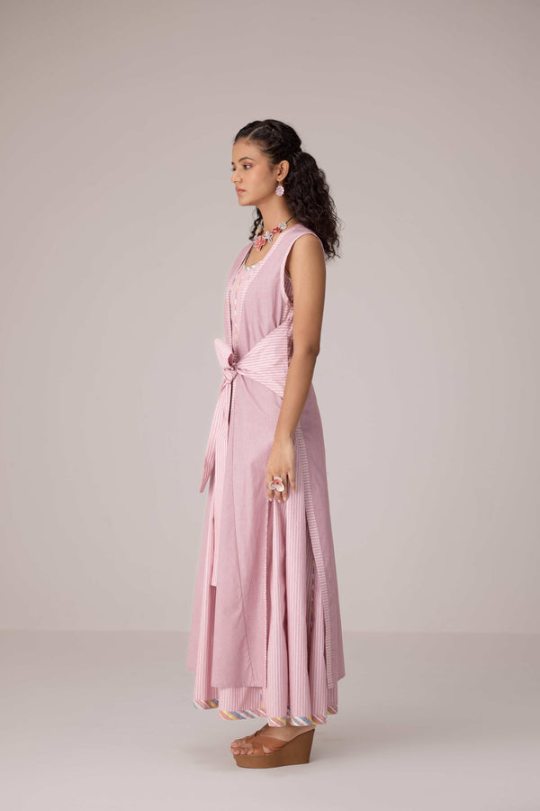 Blush pink panelled dress with contrast striped cord piping paired with a tie-up matching overlay