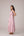 Blush pink panelled dress with contrast striped cord piping paired with a tie-up matching overlay