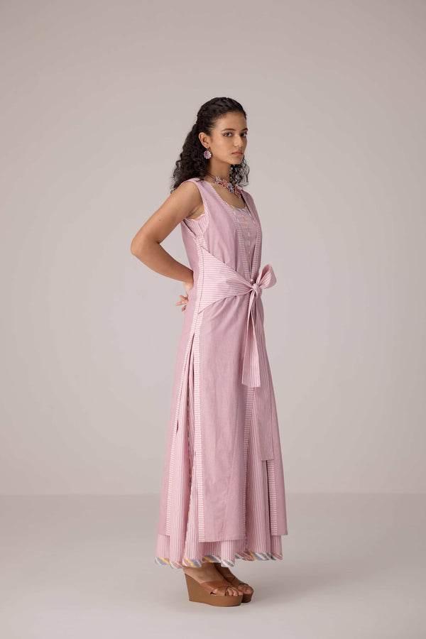 Blush pink panelled dress with contrast striped cord piping paired with a tie-up matching overlay