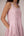 Blush pink panelled dress with contrast striped cord piping paired with a tie-up matching overlay