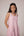 Blush pink panelled dress with contrast striped cord piping paired with a tie-up matching overlay