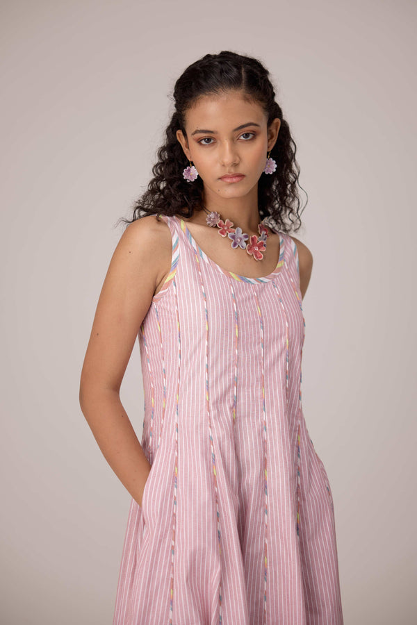 Blush pink panelled dress with contrast striped cord piping paired with a tie-up matching overlay