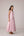 Blush pink panelled dress with contrast striped cord piping paired