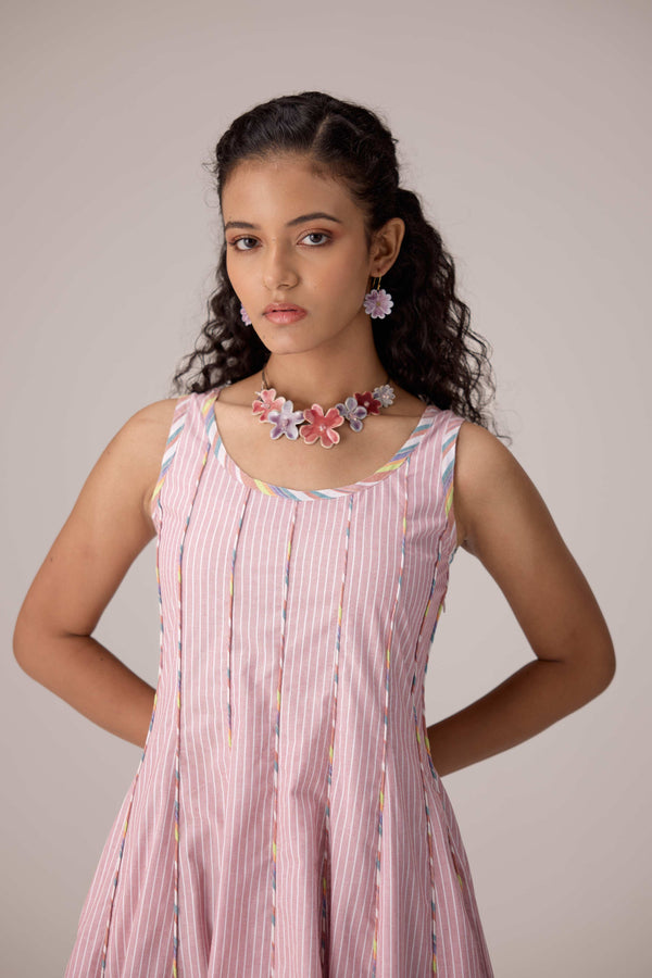 Blush pink panelled dress with contrast striped cord piping paired