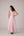 Blush pink panelled dress with contrast striped cord piping paired