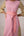 Cotton dress with outer side pockets paired with a tie wrap.