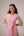 Cotton dress with outer side pockets paired with a tie wrap.