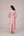 Cotton dress with outer side pockets paired with a tie wrap.