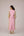 Cotton dress with outer side pockets paired with a tie wrap.