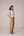 Patchwork waistcoat in pastel checks with striped puff sleeved blouse and high waisted barrel pants in cotton linen