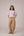 Patchwork waistcoat in pastel checks with striped puff sleeved blouse and high waisted barrel pants in cotton linen