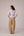Patchwork waistcoat in pastel checks with striped puff sleeved blouse and high waisted barrel pants in cotton linen