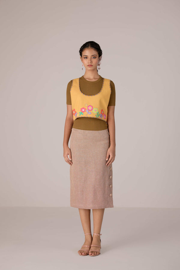 Mustard yellow cropped vest with applique embroidery paired with high waisted knee length pencil skirt in linen fabric