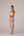 Mustard yellow cropped vest with applique embroidery paired with high waisted knee length pencil skirt in linen fabric