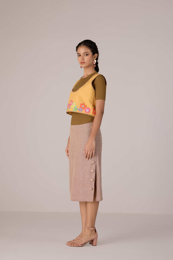 Mustard yellow cropped vest with applique embroidery paired with high waisted knee length pencil skirt in linen fabric