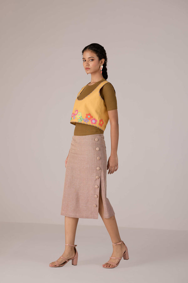 Mustard yellow cropped vest with applique embroidery paired with high waisted knee length pencil skirt in linen fabric