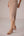Mustard yellow cropped vest with applique embroidery paired with high waisted knee length pencil skirt in linen fabric