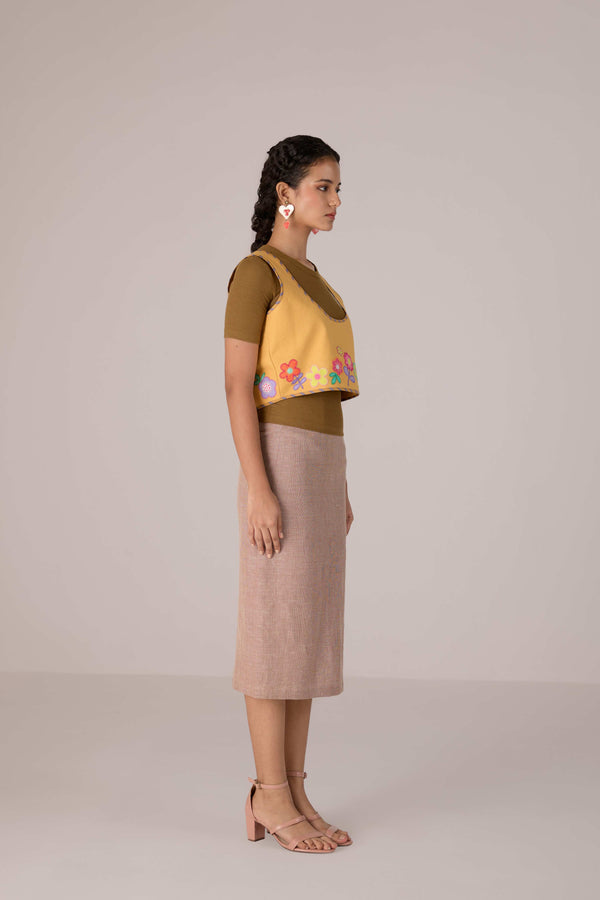 Mustard yellow cropped vest with applique embroidery paired with high waisted knee length pencil skirt in linen fabric