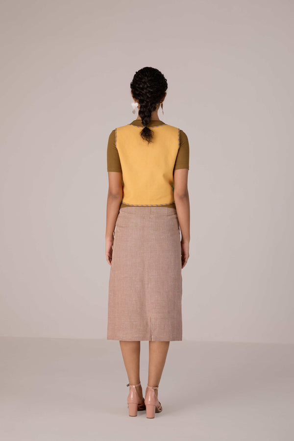 Mustard yellow cropped vest with applique embroidery paired with high waisted knee length pencil skirt in linen fabric