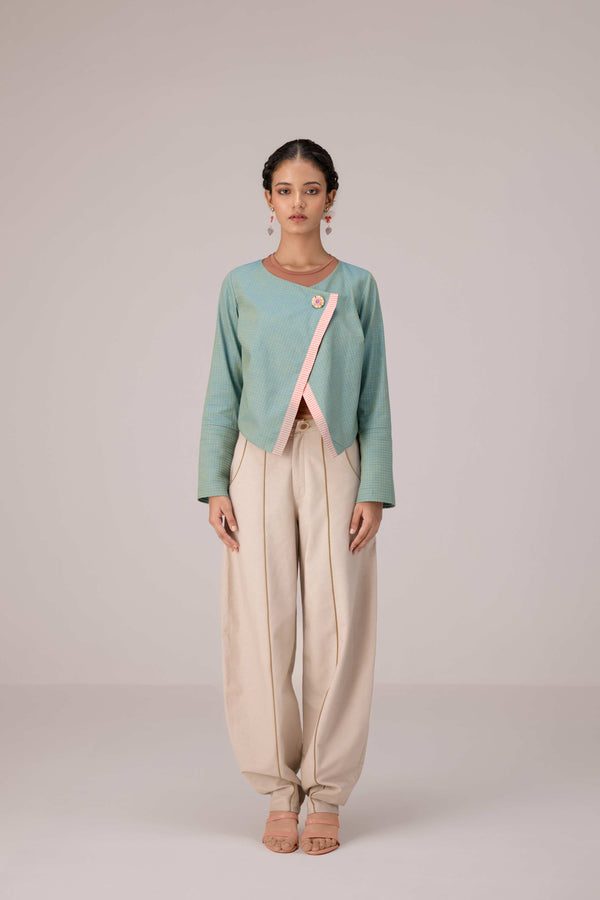 Teal wrapped jacket with barrel trousers