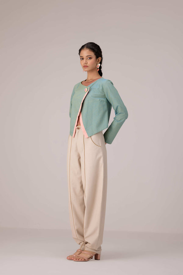 Teal wrapped jacket with barrel trousers