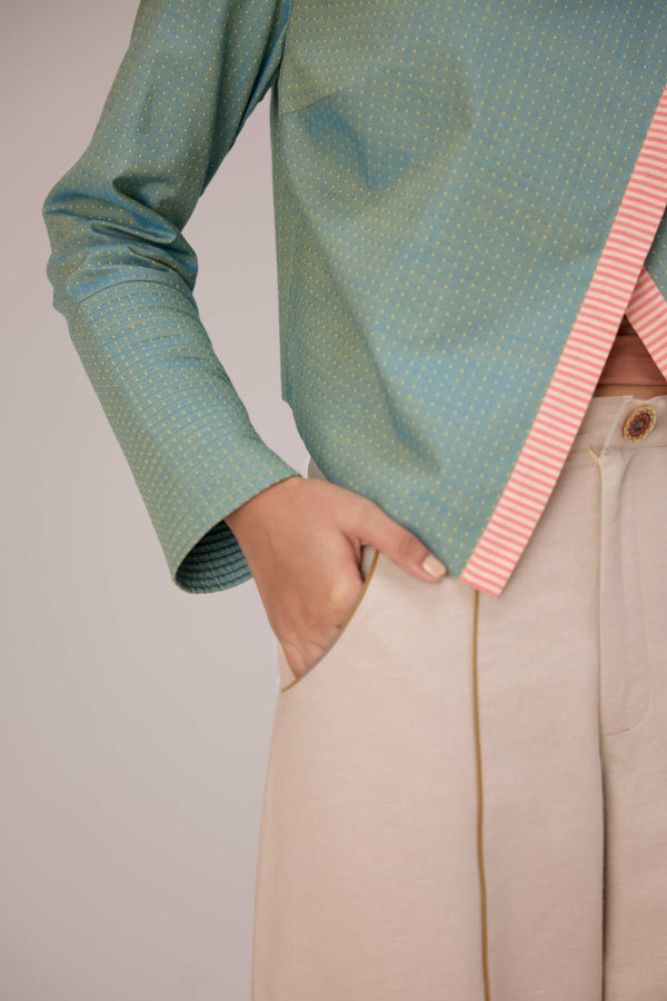 Teal wrapped jacket with barrel trousers