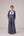 Reversable wrapped jacket in cotton linen paired with pleated striped pants in cotton