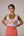 Patchwork vest top. High waisted pencil skirt in linen with buttons down the sides