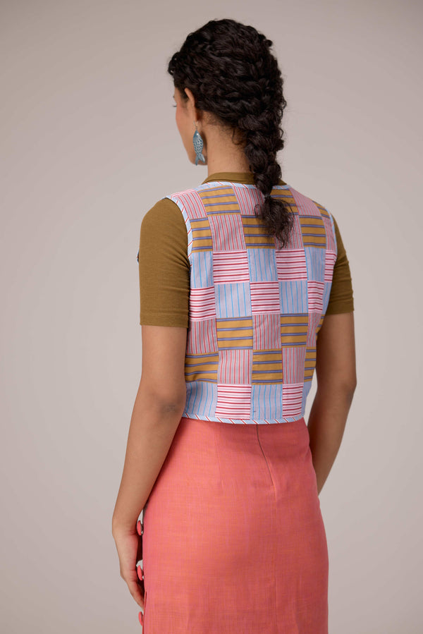 Patchwork vest top. High waisted pencil skirt in linen with buttons down the sides